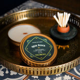 Agua Fresca Candle Tin with matches on a gold tray