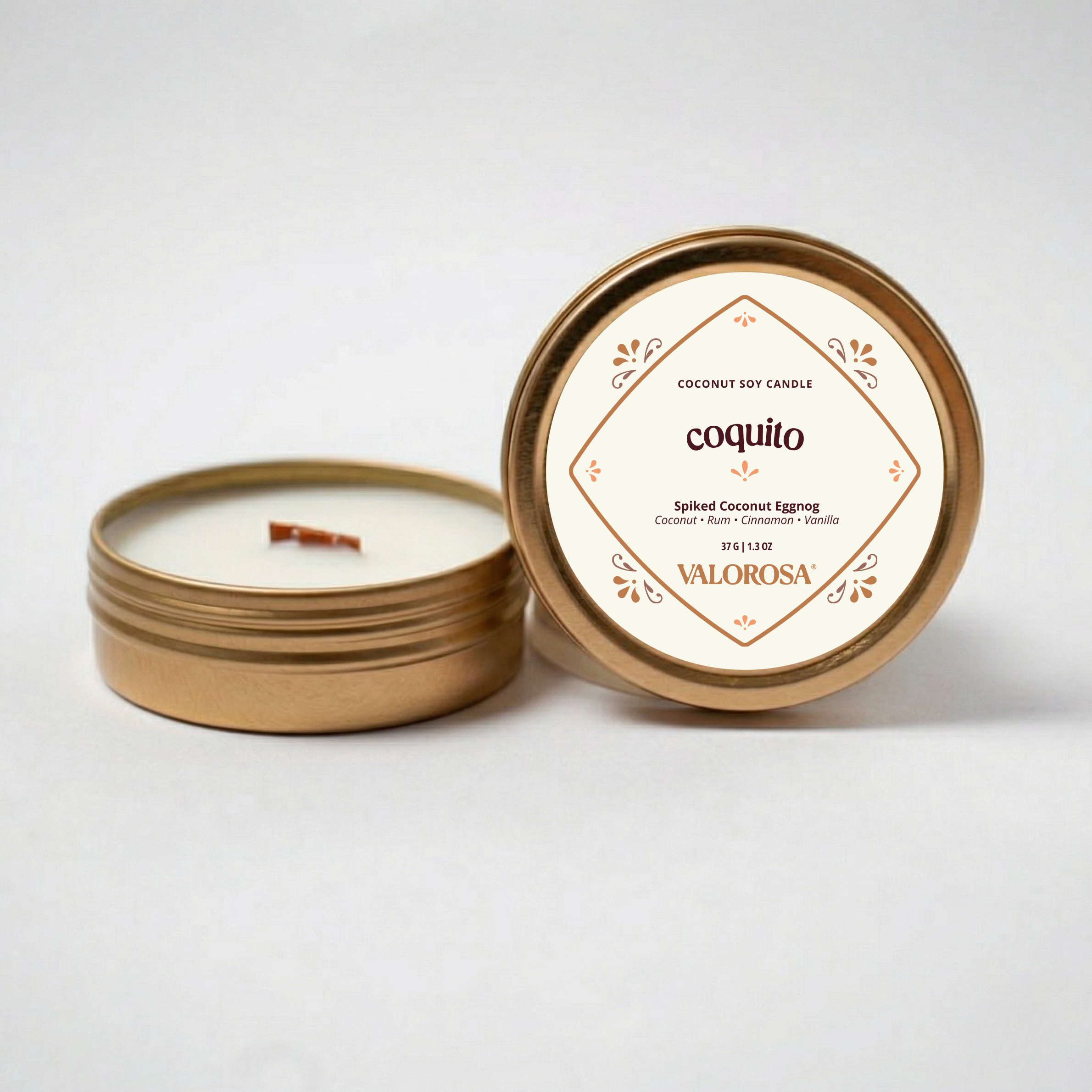 Coquito mini candle tin on a white background