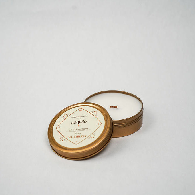 coquito candle tin on a white background