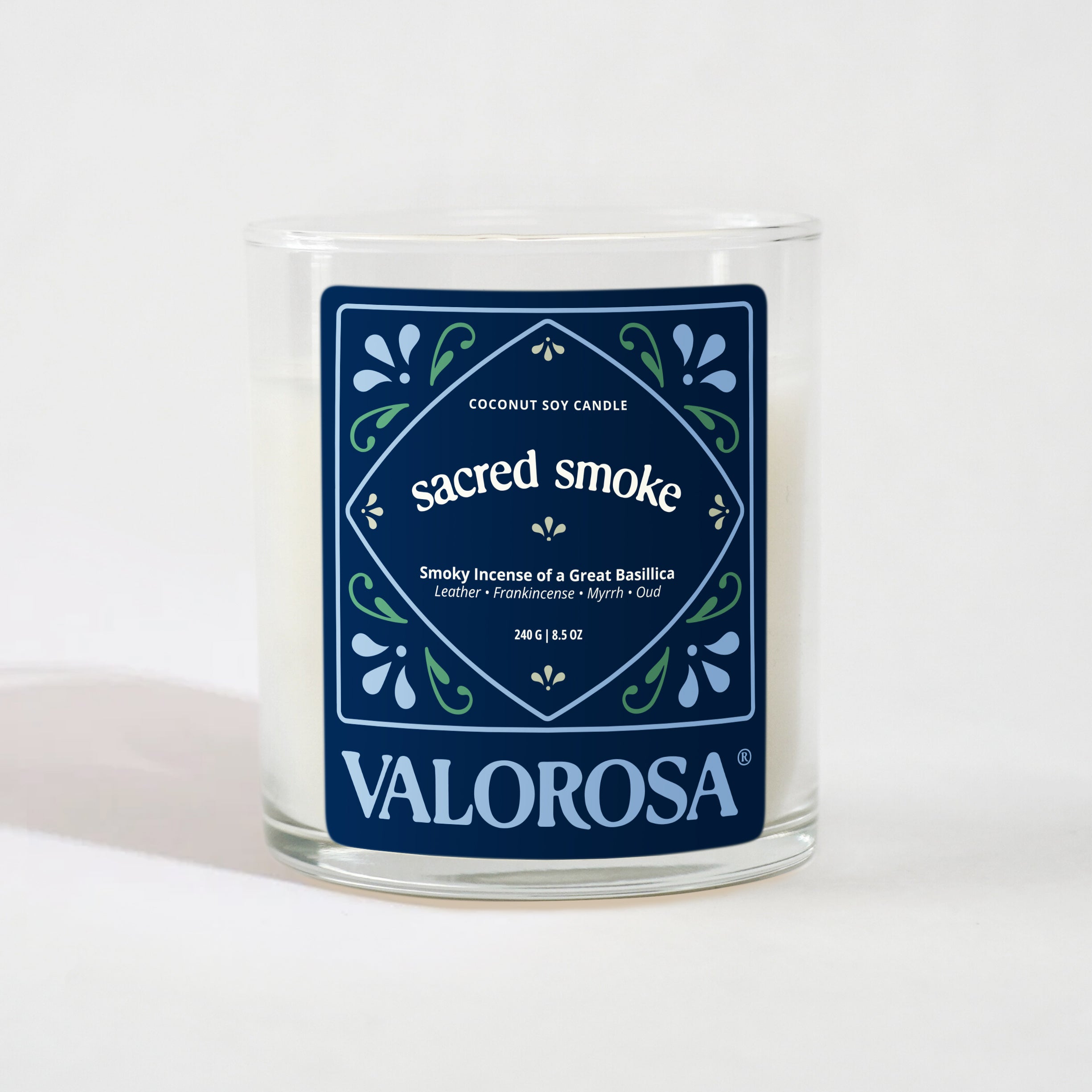 Candle with a blue label on a white background