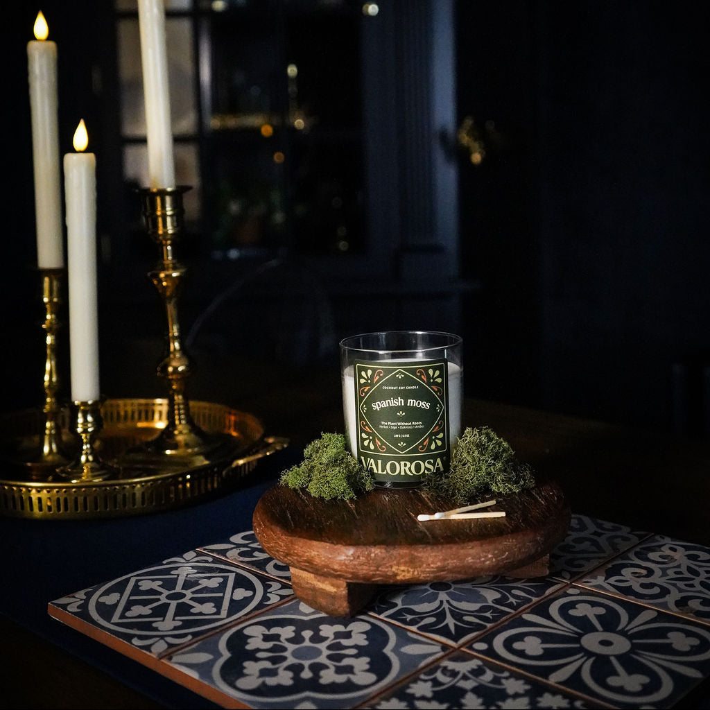 spanish moss candle tray with candles in the background.