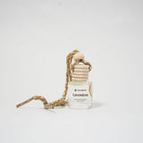 Car Diffuser bottle with wooden cap on a white background