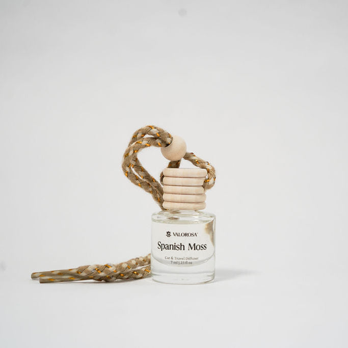 Car Diffuser bottle with wooden cap on a white background